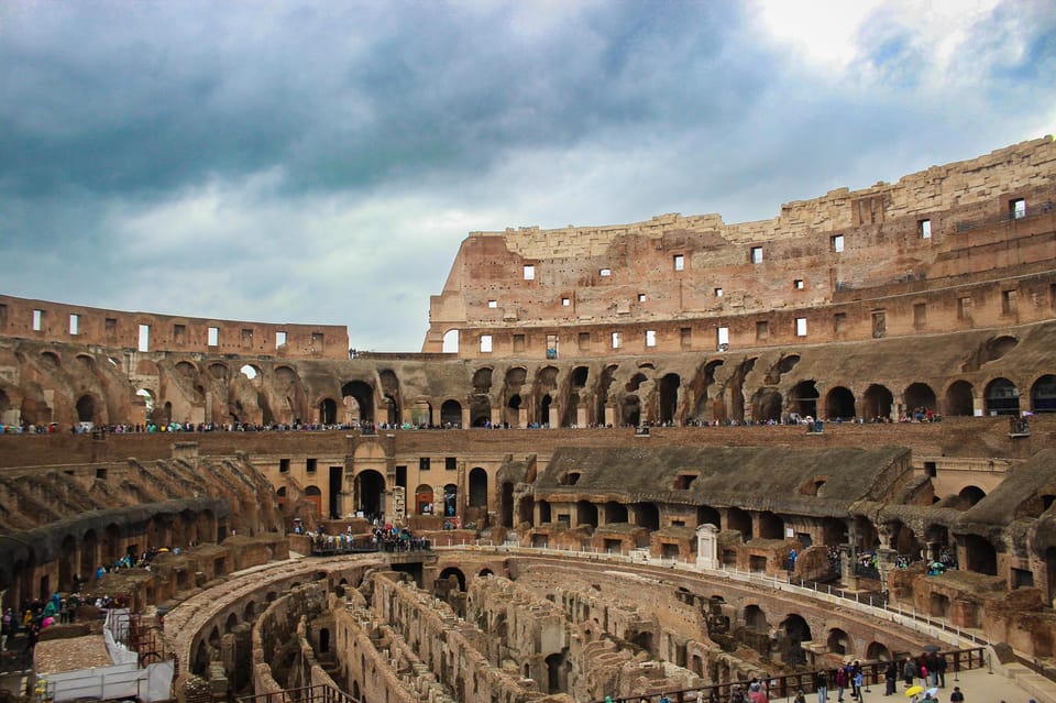 Colosseum Entry with digital audioguide and arena option - Meeting at the Arch of Constantine: getting in without wasting time