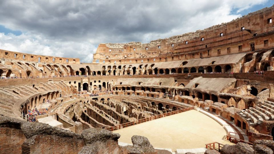 Colosseum: Gladiator’s Gate & Arena Floor Experience - Entering through Gladiator’s Gate at the Colosseum