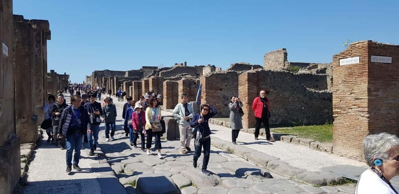 Pompeii: Entry Ticket w/ Guide and Transfers or Audio Guide - Baths, Bakeries, and Shops: The Daily Rhythm Behind the Ruins