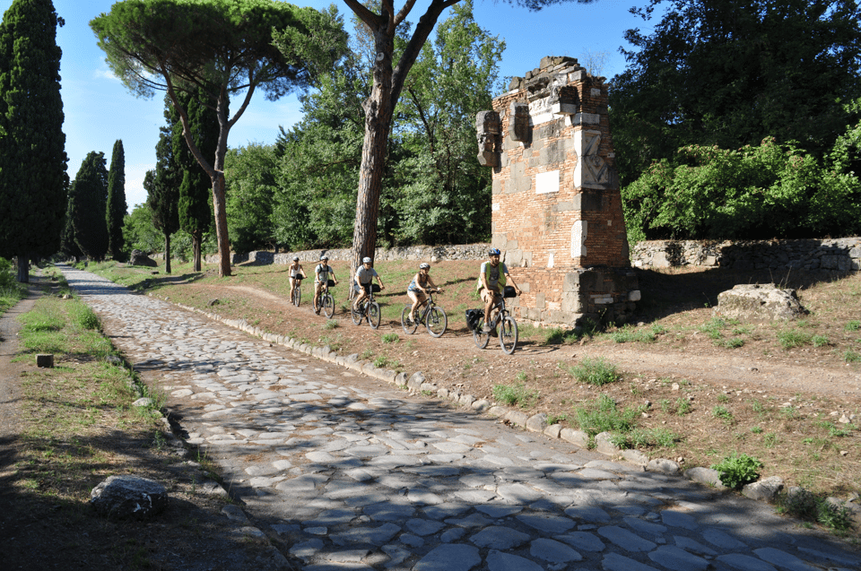 Rome: Appian Way, Catacombs, & Roman Aqueducts E-bike Tour - Caffarella Valley and Baths of Caracalla: green breaks and stone giants