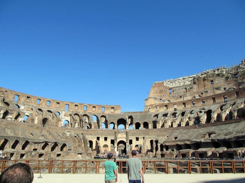 Rome: Colosseum Experience with Audio Guide and Arena Option - Meeting Point at Crown Tours Office No. 13 (how to find it fast)