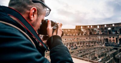 Rome: Colosseum, Roman Forum, and Palatine Hill Guided Tour - Entering the Colosseum: gladiator footsteps and the arena’s layout