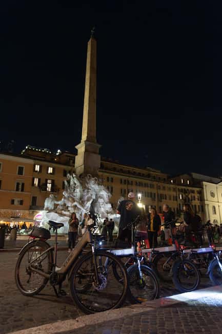 Rome: E-Bike Night Tour with Food and Wine Tasting - The mid-tour salumeria stop near Ponte Sant’Angelo: wine and cold cuts that feel like dinner