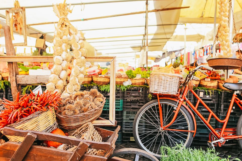 Rome: Food Tour with Market Visit - Back to La Nicchia Cafe: wine and tastings that teach you what to buy