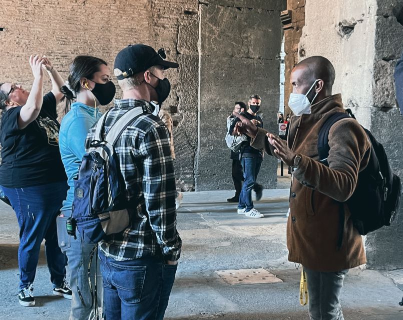 Rome: Guided Group Colosseum & Ancient City Tour - Via Sacra and the Roman Forum: the loud heart of public life